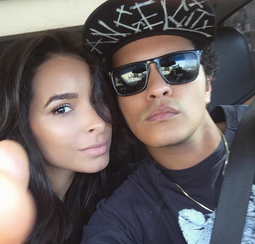 Bruno Mars with his girlfriend Jessica Caban