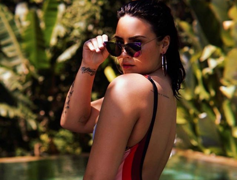 Demi Lovato Striped One Piece Swimsuit