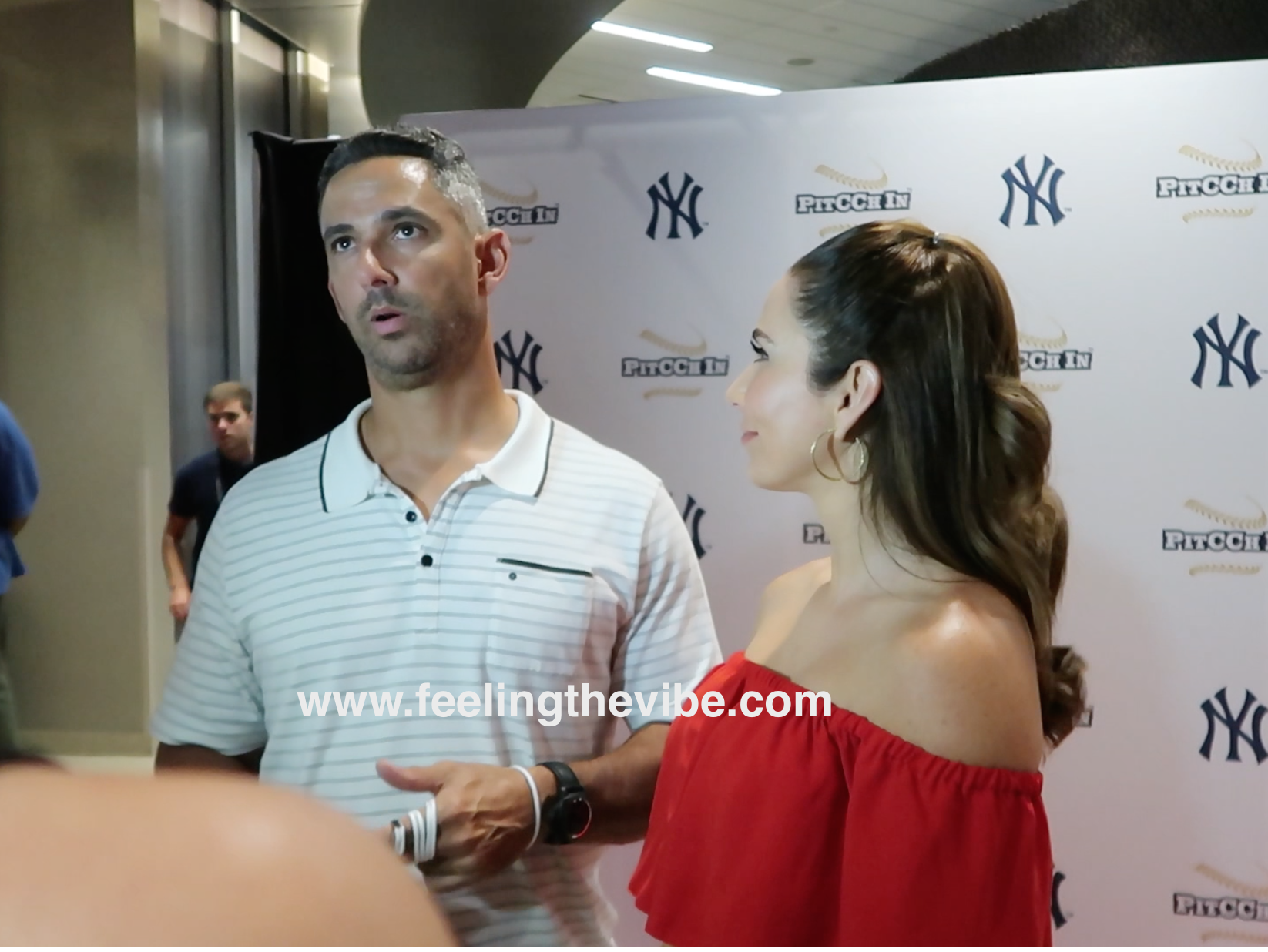 Jorge Posada and wife Laura at the CC Sabthia Charity Softball Game