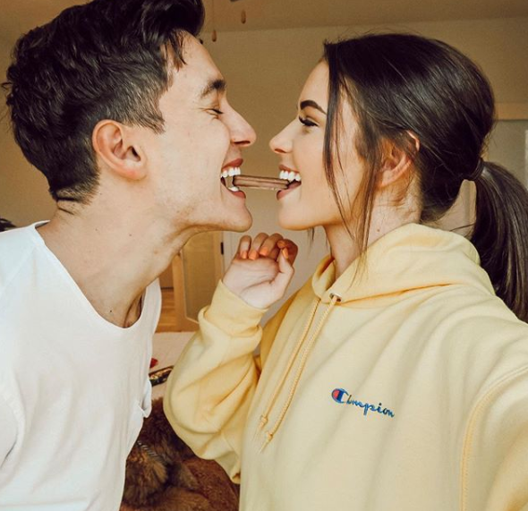 Jess and Gabriel Conte Eating Tim Tams