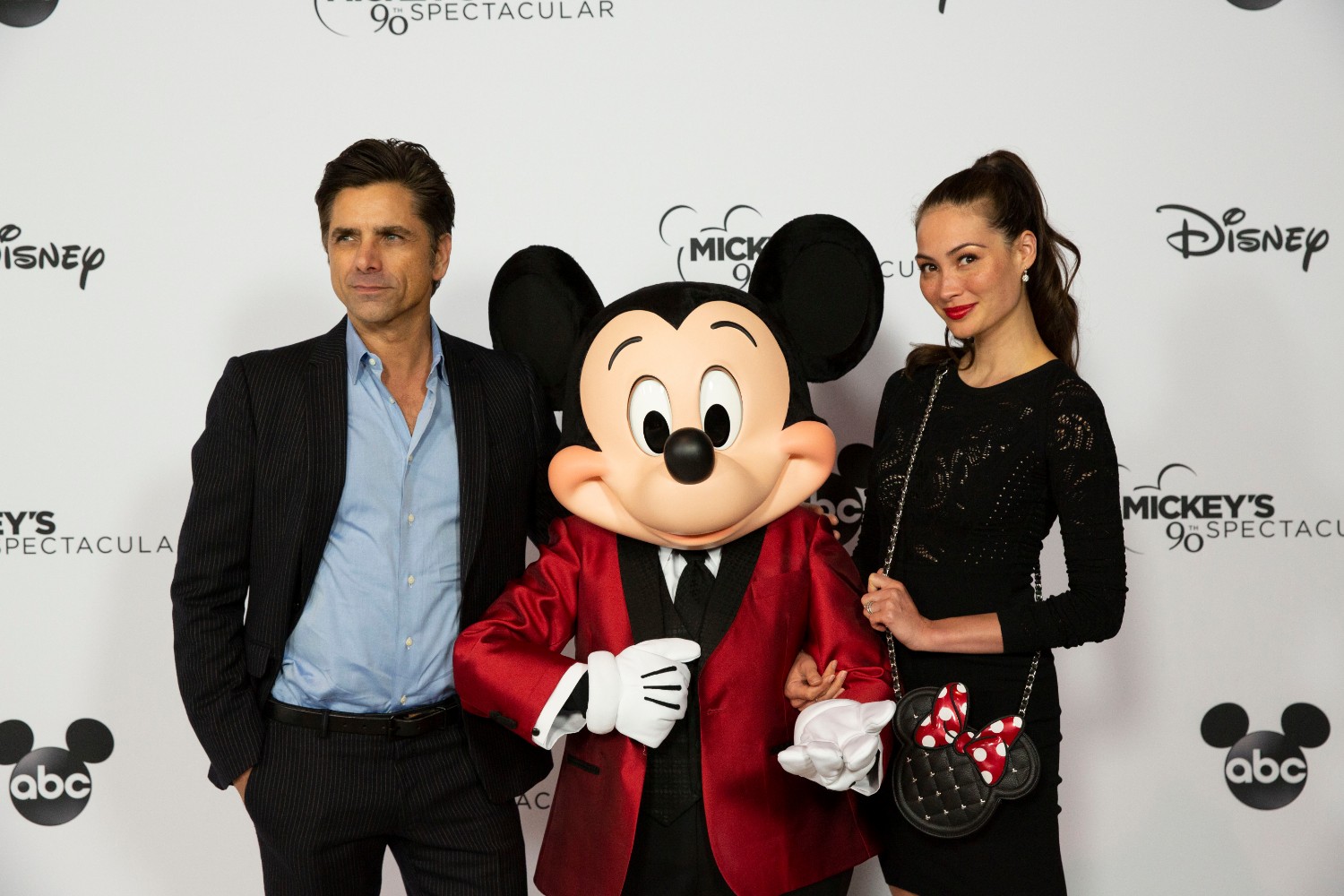 Caitlin McHugh and John Stamos at Mickey Mouse's 90th Spectacular