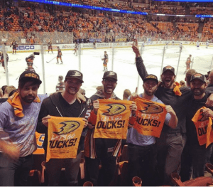 Tyler Hoechlin at a Ducks hockey game with friends