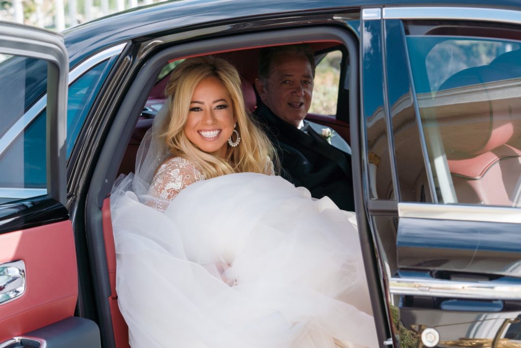 Sabrina Bryan in the car with her father on her wedding day