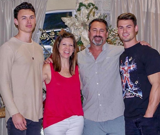 Garrett Miller with brother Tanner and parents