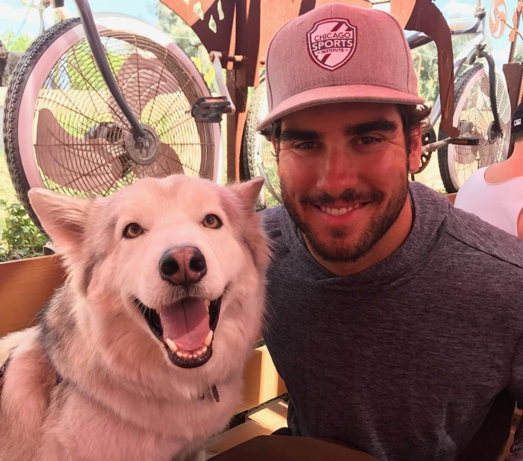Mike Tauchman of the New York Yankees with Husky Rescue