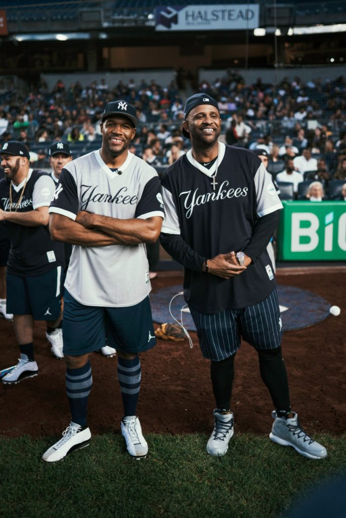 Michael Strahan and CC Sabathia at CC Sabathia's Charity Softball Game 2019