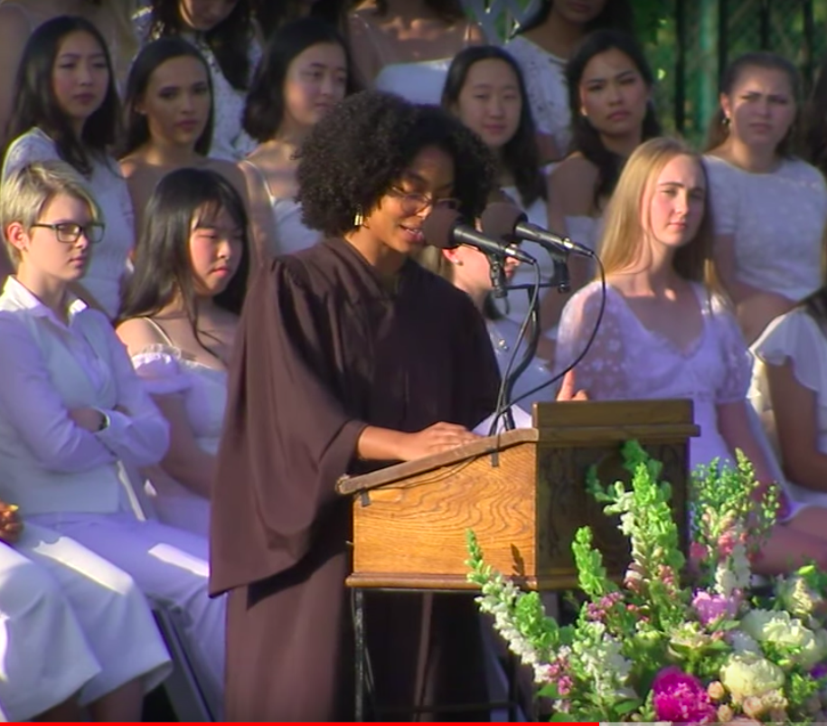 Yara Shahidi giving a speech for 2019 graduating class