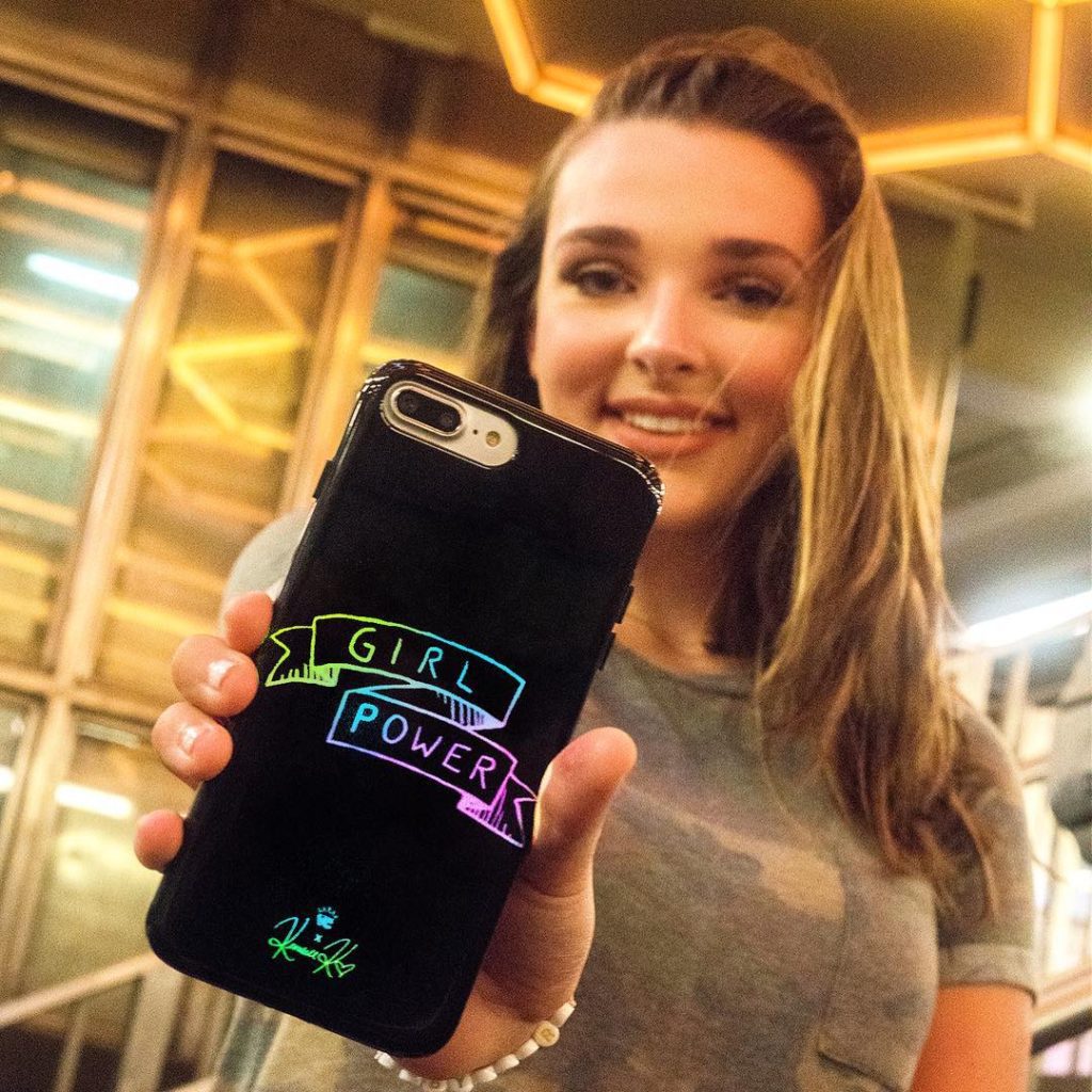 Kendall Vertes with collection of phone cases