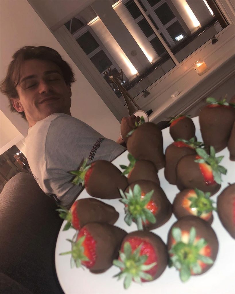 Thomas Doherty makes chocolate covered strawberries for girlfriend Dove Cameron