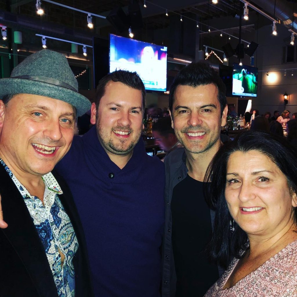 Jordan Knight with his brother, sister and nephew at Novara Restaurant.