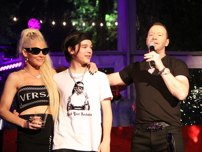 Jenny McCarthy, Elijah and Donnie Wahlberg at his 50th Birthday