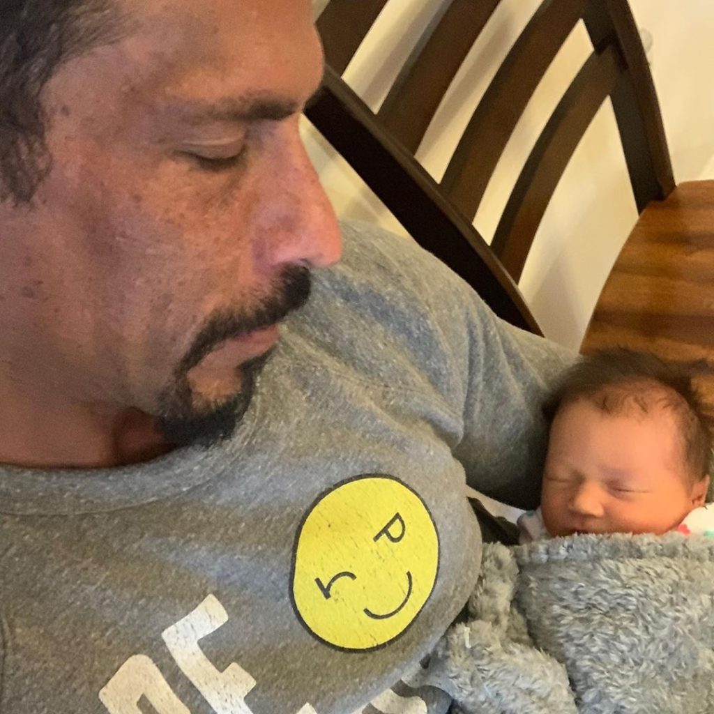 Danny Wood holding his granddaughter