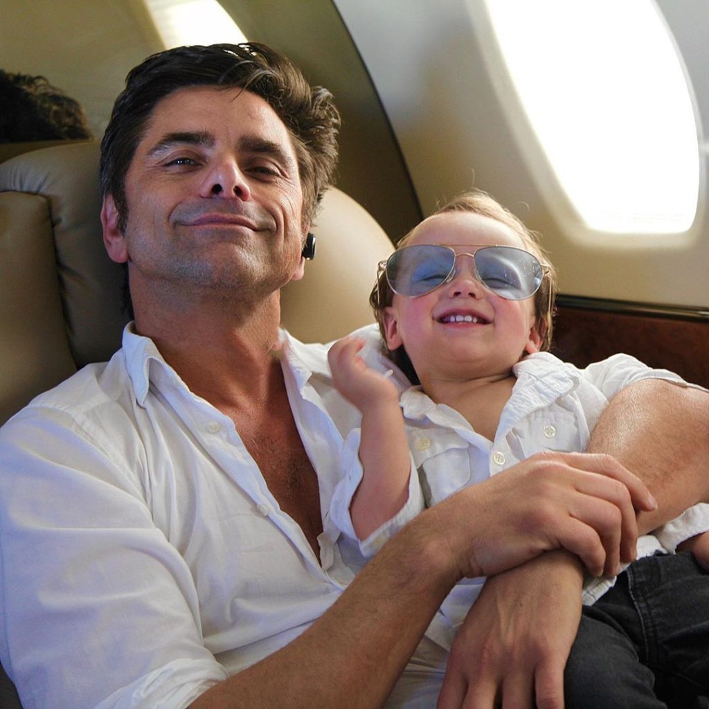 John Stamos and son Billy on a plane photo
