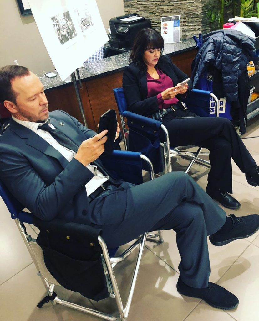 Donnie Wahlberg and Marisa Ramirez on Blue Bloods Set