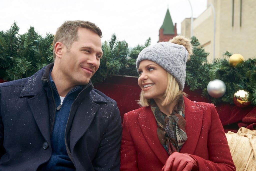 Candace Cameron's red coat, silver hat and red gloves from A Shoe Addict's Christmas