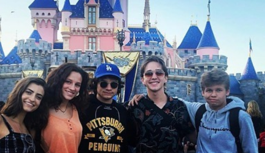 Andrea Barber's son Tate at Disney with Michael Campion and Soni Nicole