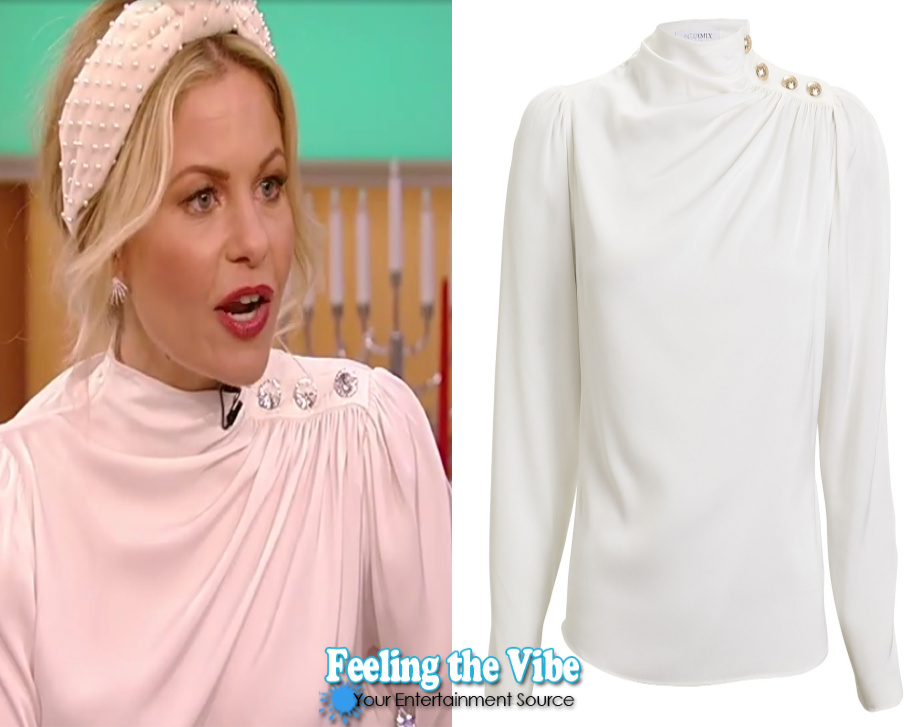 Candace Cameron Bure in white turtleneck sweater on the Tamron Hall Show