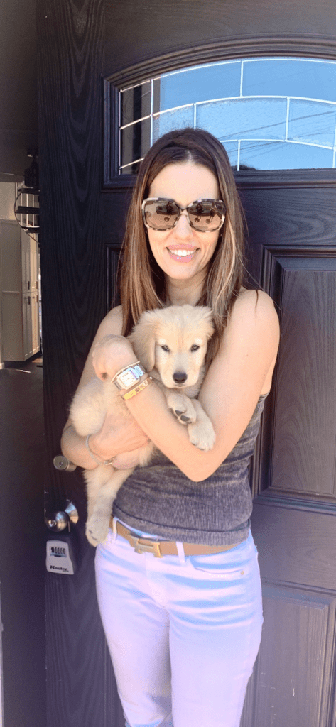 Cory Oliver with her golden retriever Bailey