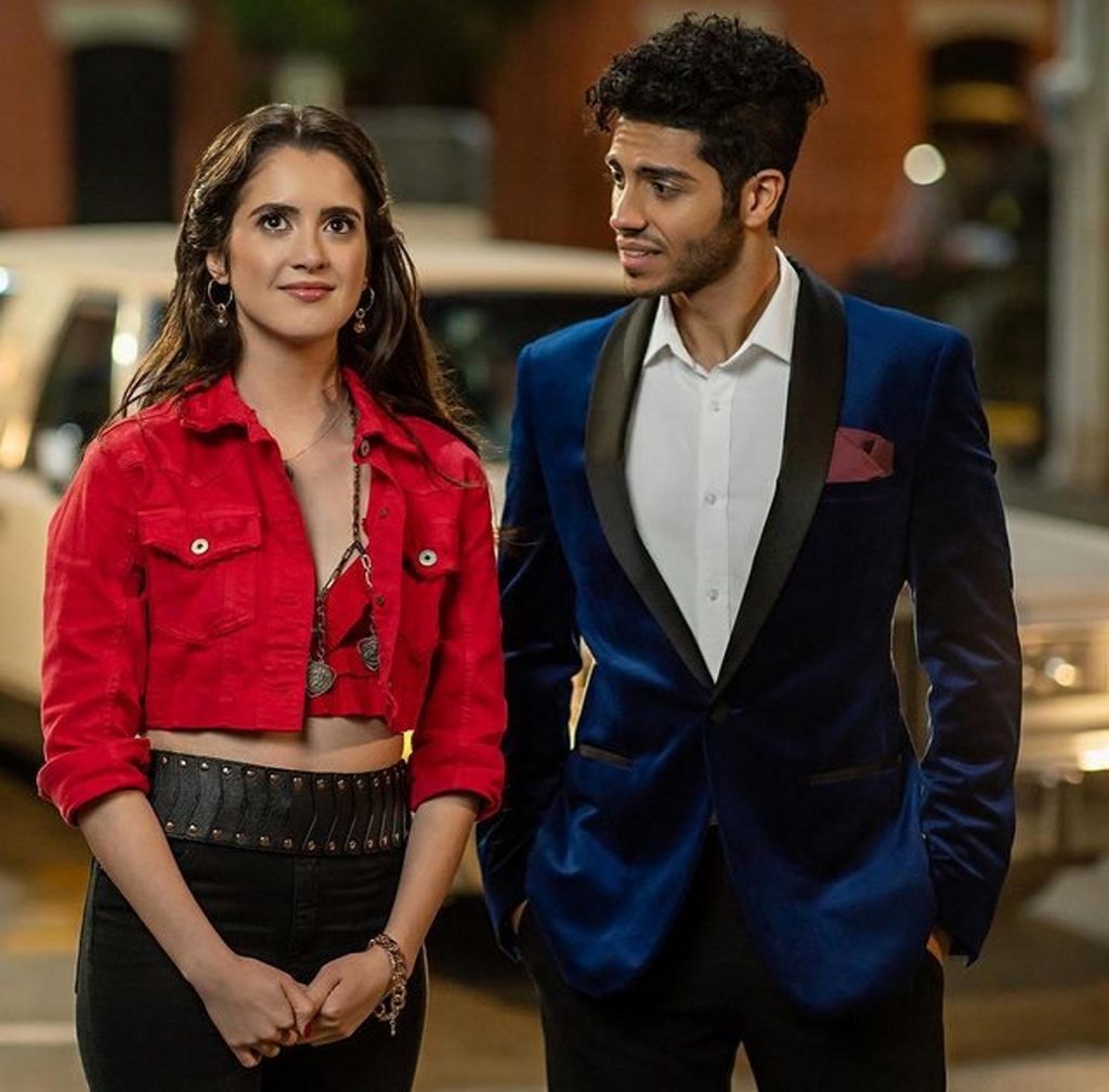 Mena Massoud and Laura Marano